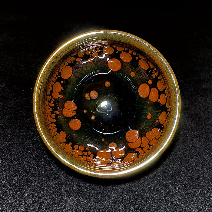 A kiln-formed oil-dripped Teacup